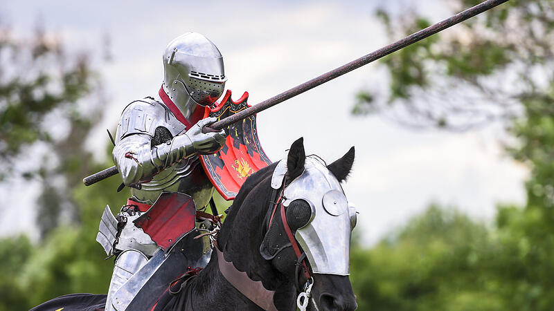 A medieval knight prepare to fight during jousting tournament