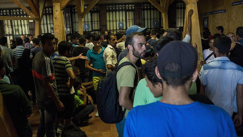 Migrants on  train to Munich, Germany at the Keleti Railway Station in Budapest