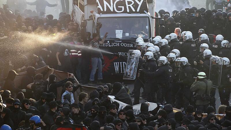 German riot police confront protesters during the demonstrations during the G20 summit in Hamburg