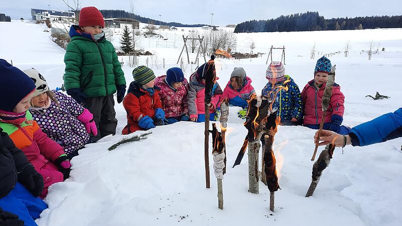 The children in the forest kindergarten don’t let the weather spoil their fun