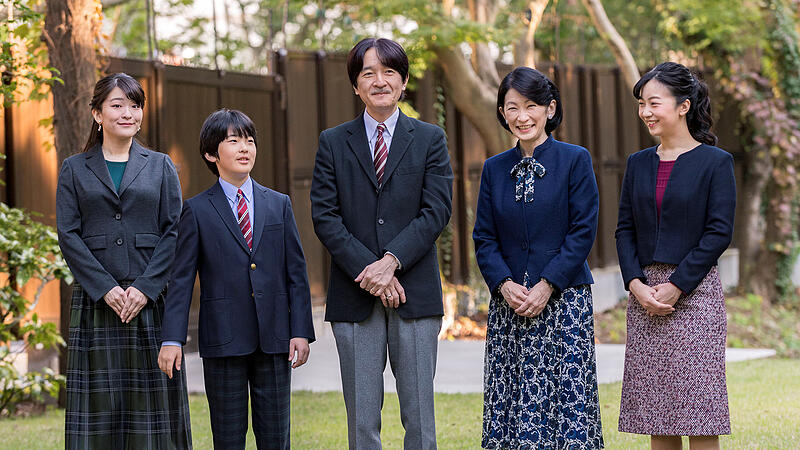 Japan's Crown Prince Akishino poses with his wife Crown Princess Kiko and their children, Princess Mako Princess Kako and Prince Hisahito at their residence in Tokyo