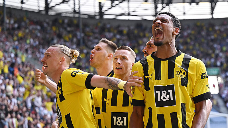 Dortmund new German leader after 3-0 in Augsburg