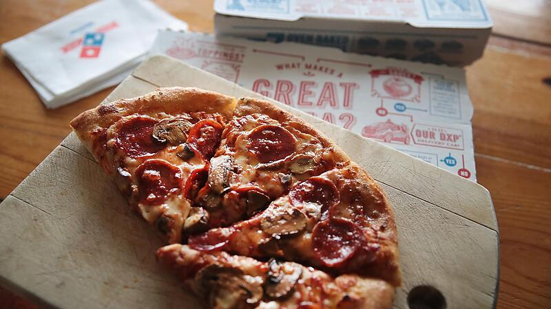 US-DOMINO'S-PIZZA-REPORTS-QUARTERLY-EARNINGS-SURPASSING-EXPECTAT