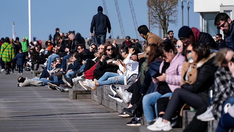 People enjoy the sun in Malmo as the spread of the coronavirus disease (COVID-19) continues