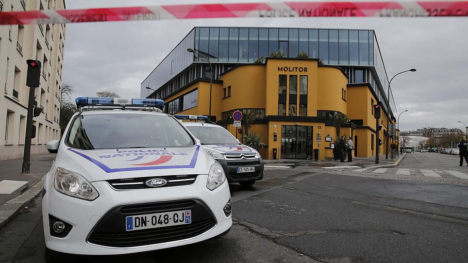 French police cars are parked outside the Molitor Hotel, where the Germany soccer team is staying ahead of a friendly soccer match, after a bomb alert from an anonymous caller, in Paris