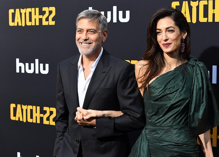 George Clooney und seine Amal strahlen auf dem Roten Teppich
