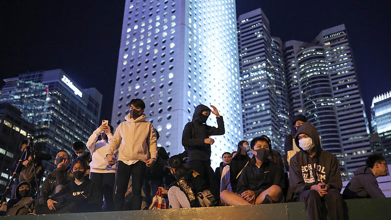 Protestors attend a gathering at the Edinburgh place in Hong Kong