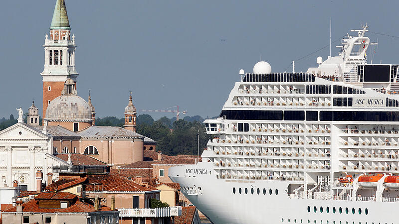 FILE PHOTO: The MSC Musica cruise ship is seen in Venice lagoon