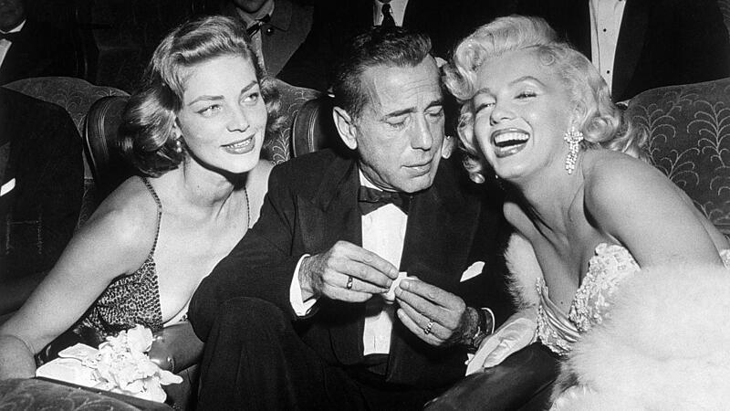 In Feierstimmung: Lauren Bacall, Humphrey Bogart und Marilyn Monroe