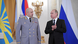 FILE PHOTO - Russian President Vladimir Putin and Colonel General Sergei Surovikin, commander of Russian forces in Syria, attend a state awards ceremony for military personnel who served in Syria, at the Kremlin in Moscow