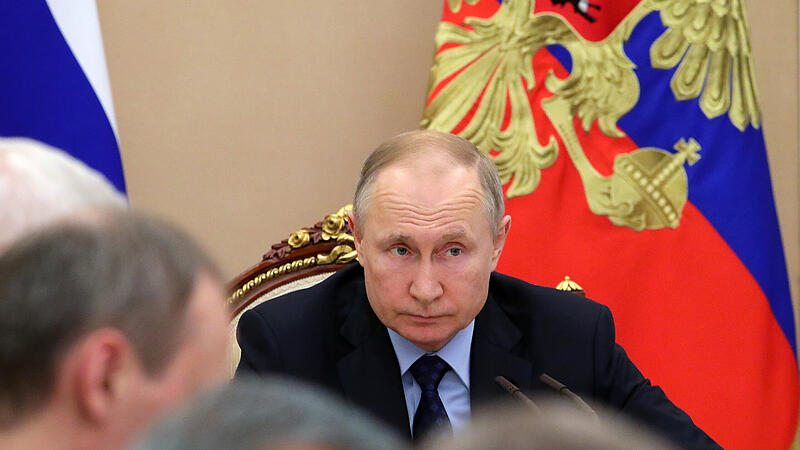 Russian President Putin chairs a meeting with members of the government in Moscow