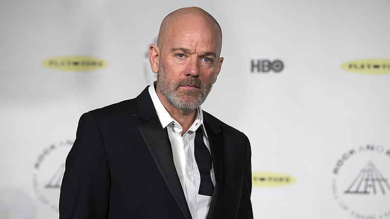 Singer Michael Stipe poses for pictures during 29th annual Rock and Roll Hall of Fame Induction Ceremony in Brooklyn, New York