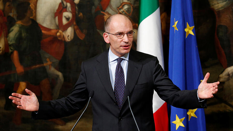 FILE PHOTO: Italian Prime Minister Enrico Letta gestures during a news conference at Chigi Palace in Rome