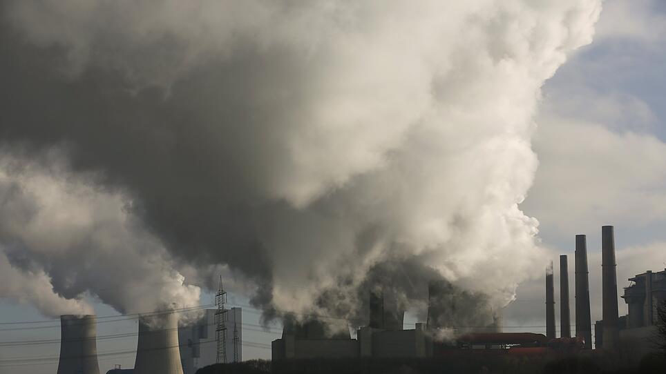 File photo of smoke billowing from the RWE brown coal power plant in Neurath near Garzweiler open-cast brown coal mine, west of Cologne