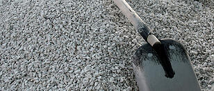 Shovel on a heap of gravel