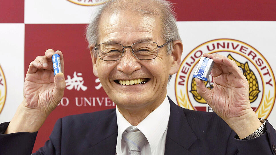 Asahi Kasei honorary fellow Akira Yoshino holds lithium ion batteries in Nagoya, Japan