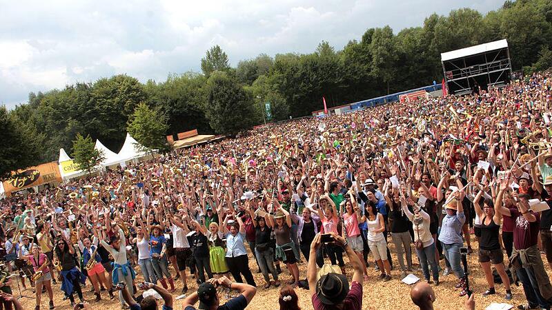 Der Weltuntergangsstimmung getrotzt: 25.000 Woodstocker tanzten im Gatsch
