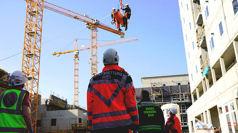 Injured workers had to be rescued from the building shell with a site crane