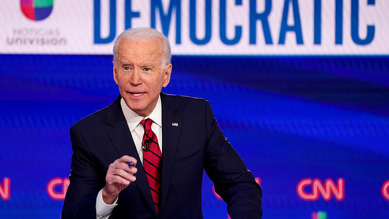 FILE PHOTO: Democratic U.S. presidential candidate and former Vice President Joe Biden speaks at the 11th Democratic candidates debate of the 2020 U.S. presidential campaign in Washington