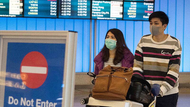 Keine Reisen nach China: Firmen reagieren auf Coronavirus-Epidemie