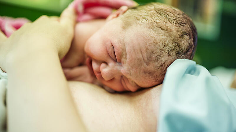 Baby girl few minutes after the birth,baby geburt