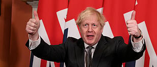 FILE PHOTO: Britain's Prime Minister Boris Johnson signs the Brexit trade deal with EU