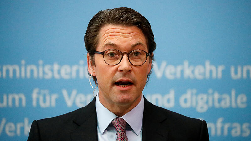 German Transport Minister Andreas Scheuer addresses a news conference in Berlin