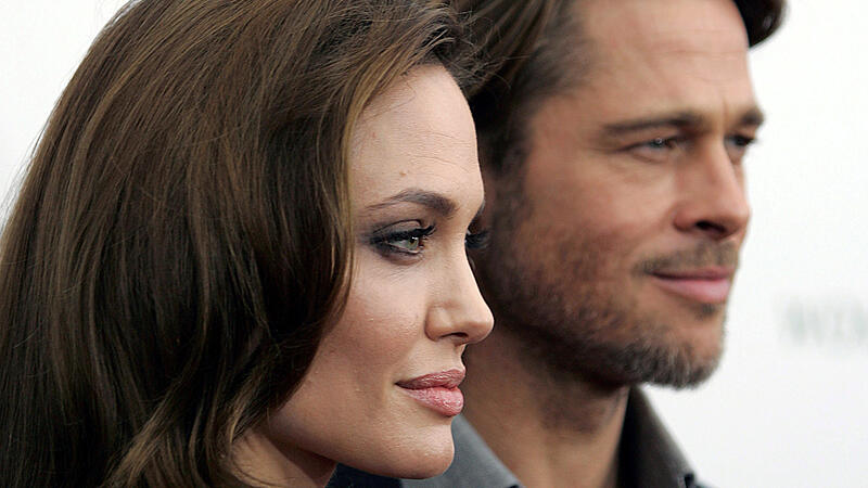 Angelina Jolie and Brad Pitt arrive at the screening of her directorial debut "In the Land of Blood and Honey" in New York